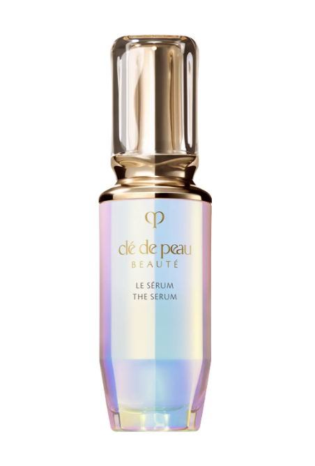 クレ・ド・ポー ボーテ LE SÉRUM。金色のキャップと虹色のボトル